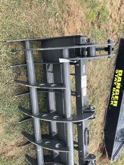 skid steer clamshell grapple|cid skid steer grapple.